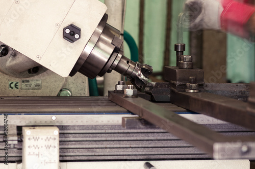 Photo: CNC drilling and miling in a workshop CNC drilling and miling in a workshop