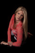 Photo: woman red top lay black serious woman red top lay black serious