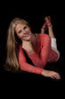 Photo: woman red top lay on black smile woman red top lay on black smile
