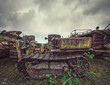 decaying construction vehicles