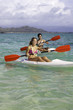 couple paddling surfskis