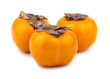 Three persimmon fruits