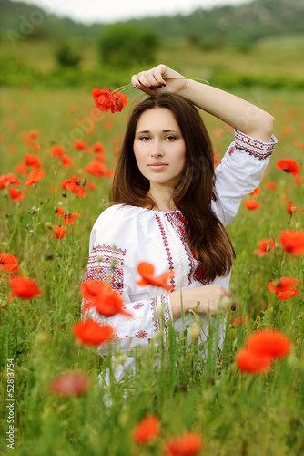 Photo: сalm girl in poppes field сalm girl in poppes field