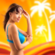 attraktive junge Frau im Bikini vor sommerlichen Hintergrund