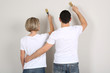 Photo: Young couple doing renovation together. Young couple doing renovation together.