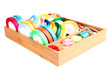 Foto: Bright silk ribbons in wooden box, isolated on white Bright silk ribbons in wooden box, isolated on white