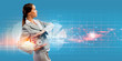 Photo: Business woman holding alarmclock Business woman holding alarmclock