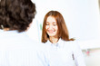 Two students smiling