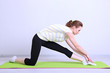 Portrait of beautiful young woman exercises