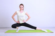 Portrait of beautiful young woman exercises