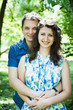 Closeup of happy middle-age couple hugging in park