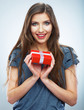 Portrait of young happy smiling woman hold red gift box. Isolat