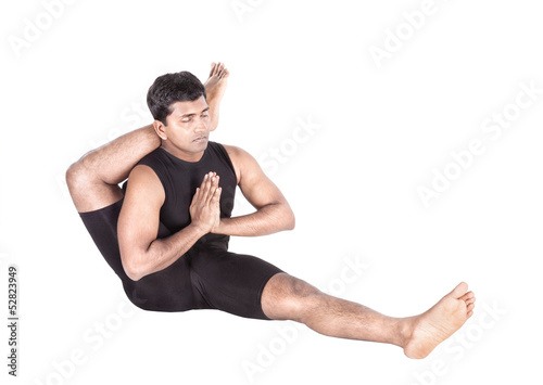 Photo: Yoga by Indian man on white Yoga by Indian man on white