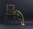 Vintage wooden chair and trumpet