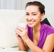 Young beautiful girl with tea cup