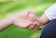 little baby's foot holding in mother's hand