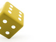 One yellow dice rendered isolated