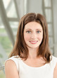 Foto: Portrait of smiling beautiful young businesswoman Portrait of smiling beautiful young businesswoman