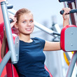 Woman at the gym exercising