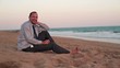 Video: Happy businessman with tablet computer on the beach Happy businessman with tablet computer on the beach