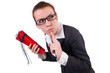 Businesswoman with dynamite on white
