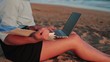 Video: Businesswoman working with documents and laptop on the beach Businesswoman working with documents and laptop on the beach