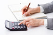 Hands working on the calculator