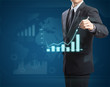 Male hand drawing a graph.