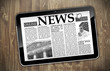 Tablet E-Paper auf Holzwand
