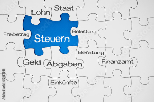 Photo: Puzzle in Blau mit Steuern Puzzle in Blau mit Steuern