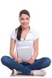 casual woman sits with tablet