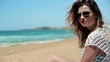 Video: Beautiful sexy woman on the beach looking at camera Beautiful sexy woman on the beach looking at camera
