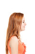 Photo: Cute young girl, side view, isolated on white background Cute young girl, side view, isolated on white background