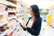 A woman buys sweets
