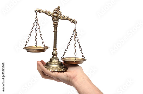 Photo: Holding Decorative Scales of Justice Holding Decorative Scales of Justice