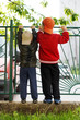 Brothers in cap outdoor