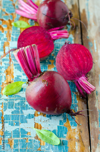 Photo: Fresh beet on a wooden background Fresh beet on a wooden background