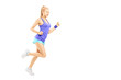 Photo: Full length portrait of a young female running Full length portrait of a young female running