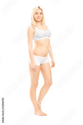 Photo: Young beautiful woman in white cotton underwear Young beautiful woman in white cotton underwear