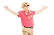 Foto: Happy mature man on a vacation spreading his arms Happy mature man on a vacation spreading his arms
