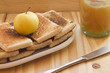 Breakfast with toast on a plate, an apple and fresh apple jam