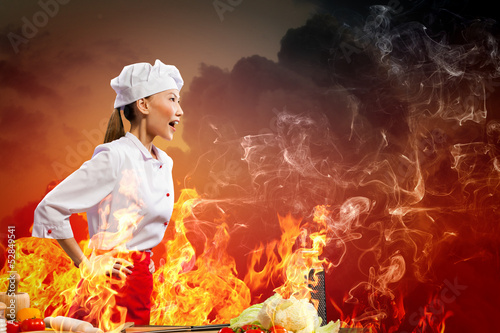 Photo: Asian female cook in anger Asian female cook in anger
