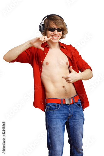 Photo: Happy smiling young man dancing Happy smiling young man dancing