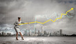 Photo: Businesswoman pulling graphic Businesswoman pulling graphic