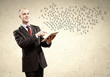 Foto: Businessman holding tablet pc Businessman holding tablet pc