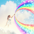 Photo: Little girl drawing rainbow Little girl drawing rainbow