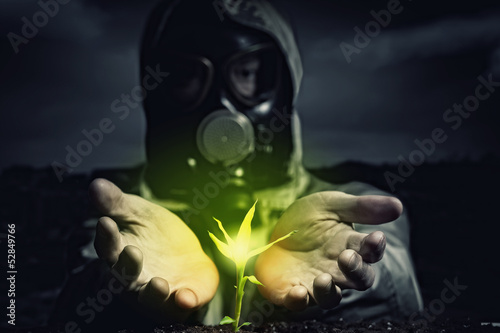 Photo: Young man in a protective suit Young man in a protective suit