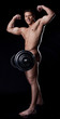 Smiling muscular nude heavyweight posing with rod