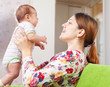  mother holds little baby