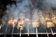 Shish kebab on the grill with smoke.